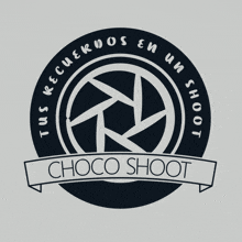 a logo for choco shoot shows a camera lens