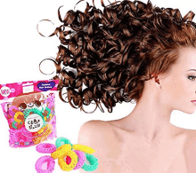 a woman with curly hair and a bag of hair rollers