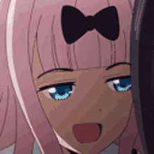 a close up of a anime girl with pink hair and blue eyes with a bow on her head .