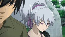a man and a woman are standing next to each other and the woman has purple eyes