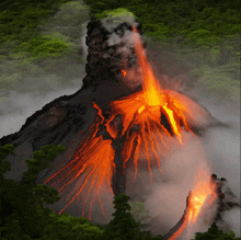 a volcano is erupting with lava pouring out of it