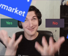 a man wearing headphones holds up his hands in front of a sign that says yes or no