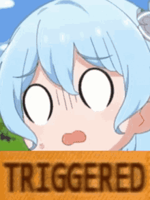 a picture of a girl with a surprised look on her face and the word triggered below her