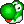 a pixel art of a green frog with a red tongue and white eyes .