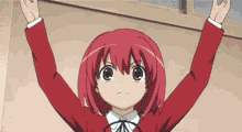 a girl with red hair is standing with her arms outstretched .