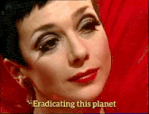 a close up of a woman 's face and the words eradicating this planet