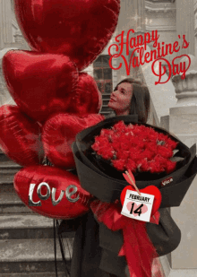 a woman holding a bouquet of red roses in front of a bunch of red heart shaped balloons that say love