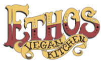 a logo for ethos vegan kitchen with a yellow ribbon