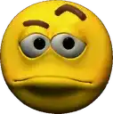a close up of a yellow smiley face with big eyes and a sad look on its face .