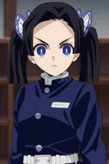 a girl with pigtails and blue eyes from demon slayer is standing in front of a shelf .