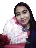 a woman is holding a bunch of money and a bouquet of flowers .