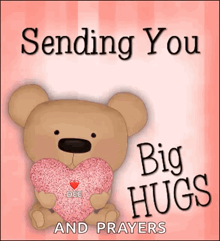 a teddy bear is holding a pink heart with the words sending you big hugs and prayers