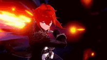 a red haired anime character is holding a sword in a dark room with fire coming out of his hands .