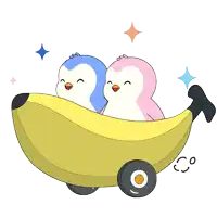 two penguins are sitting in a banana cart