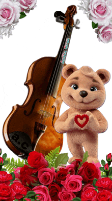 a picture of a teddy bear holding a heart next to a violin