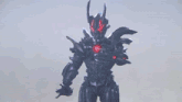 a purple robot with horns is standing in front of a purple light coming out of his chest .