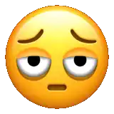 a yellow smiley face with a sad look on its face