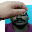 a man with a mustache is being touched by a hand in a pixel art style .