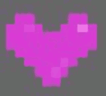 a pixel art heart is glowing in the dark on a gray background .