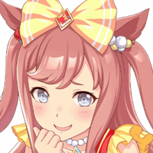 a girl with a bow on her head is smiling