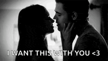 a man and a woman are kissing in a black and white photo with the words `` i want this with you < 3 '' .