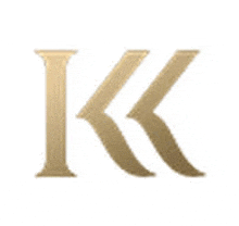 a gold letter k on a white background with a shadow .