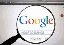 a magnifying glass shows the google search page