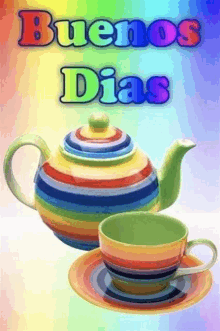 a colorful teapot and cup on a saucer with the words buenos dias above it