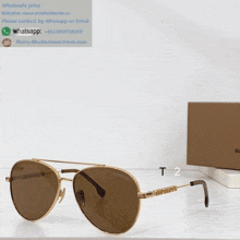 a pair of burberry sunglasses on a table next to a box