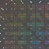 a bunch of different colored circles and squares on a dark background