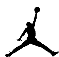 a silhouette of a man holding a basketball in his hands