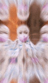 a blurry image of a person wearing a face mask