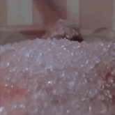a man 's face is partially covered in ice