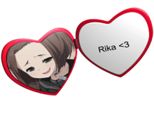 a heart shaped mirror with a picture of a girl and the words rika < 3