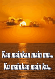 a sunset over a body of water with the words kau mainkan main mu