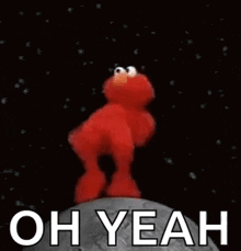 elmo from sesame street is dancing on the moon with a planet in his hands .
