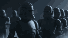 a group of stormtroopers are standing in a dark room with the words bad batch in the corner