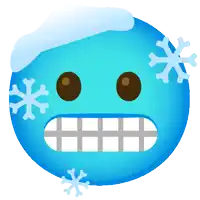 a blue smiley face with snowflakes coming out of it