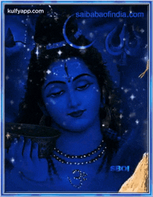 a picture of a blue shiva with the website saibabaofindia.com at the top