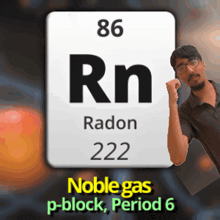 a man stands in front of a periodic table for radon