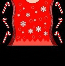 a red christmas sweater with white snowflakes and candy canes on a black background .