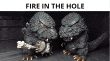 a picture of two monsters with the words fire in the hole above them