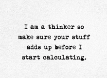 a black and white typewriter says i am a thinker so make sure your stuff adds up before i start calculating