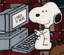 a cartoon of snoopy sitting in front of a computer that says " i hate it here "