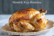 a roasted chicken on a plate with the words " hendrik kyp bootsma " written above it