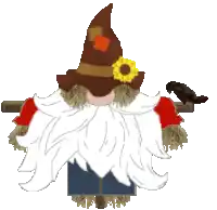 a scarecrow with a beard and a hat has a bird on his shoulder