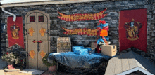 a house decorated with harry potter decorations and a table with gifts .