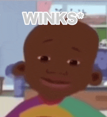 a close up of a child 's face with the word winks written above it