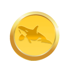 a gold coin with a whale silhouette on it