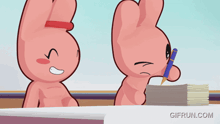 two pink cartoon rabbits are sitting at a desk with a stack of papers and a gifrun.com logo